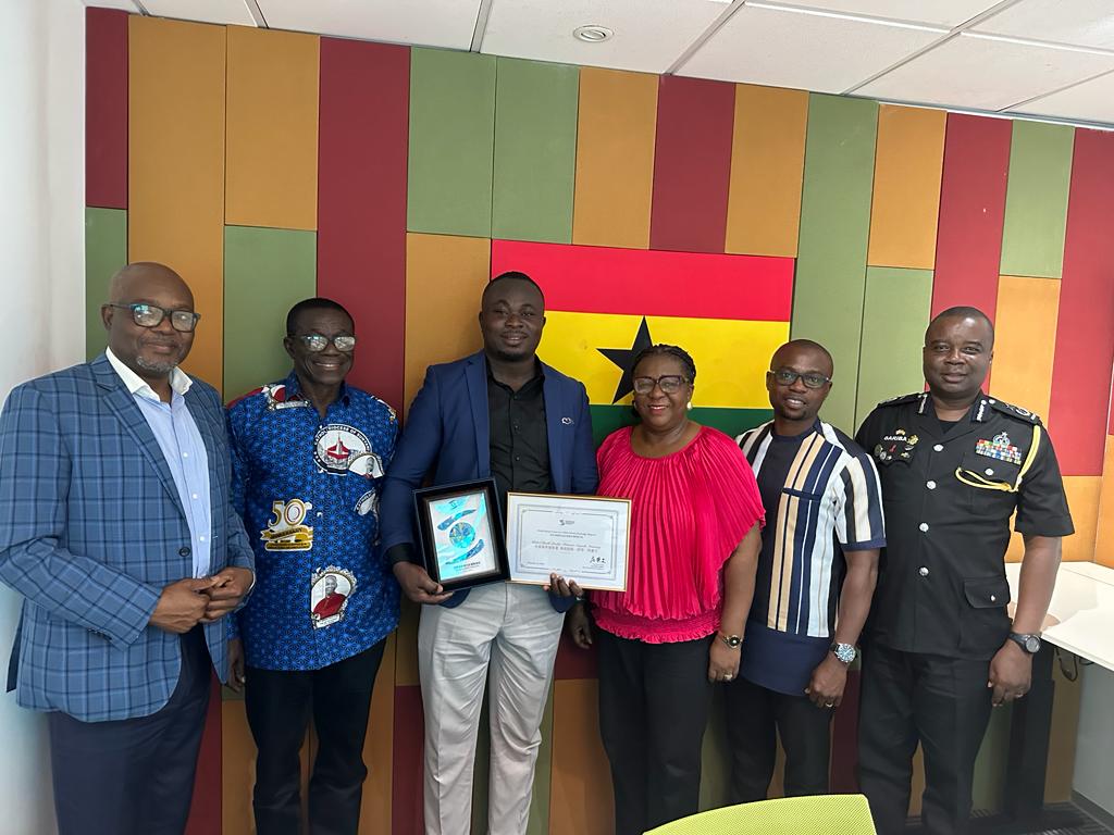 The Board Members of the Ghana Domain Name Registry with Mr. Francis Acquah Amaning